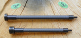 Two TAP-DOA™️ ULTRA-Light stabilizers for archery with a sleek carbon design, enhancing bow control and minimizing noise