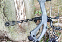 RPG stabilizer adapter mounted on a bow, showcasing a sleek design for enhanced archery performance and stability